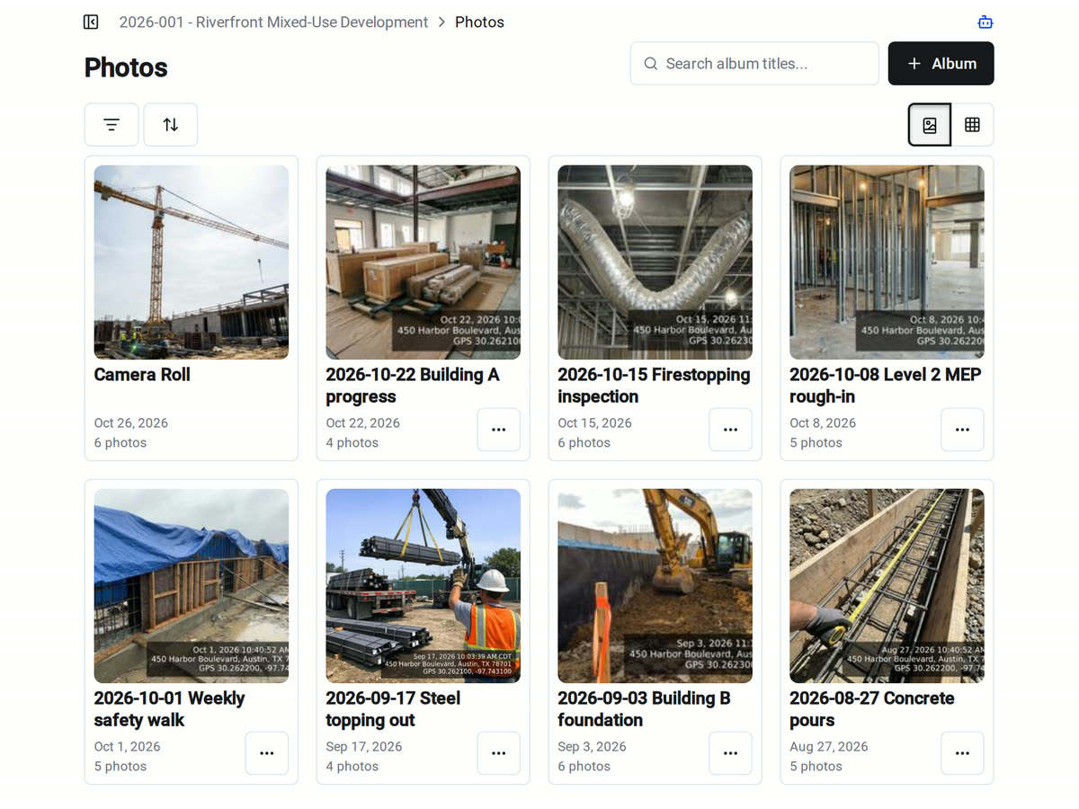 The Photos page in Constructable showing eight project albums, each with a cover photo, a dated title such as 2026-10-15 Firestopping inspection, and a photo count